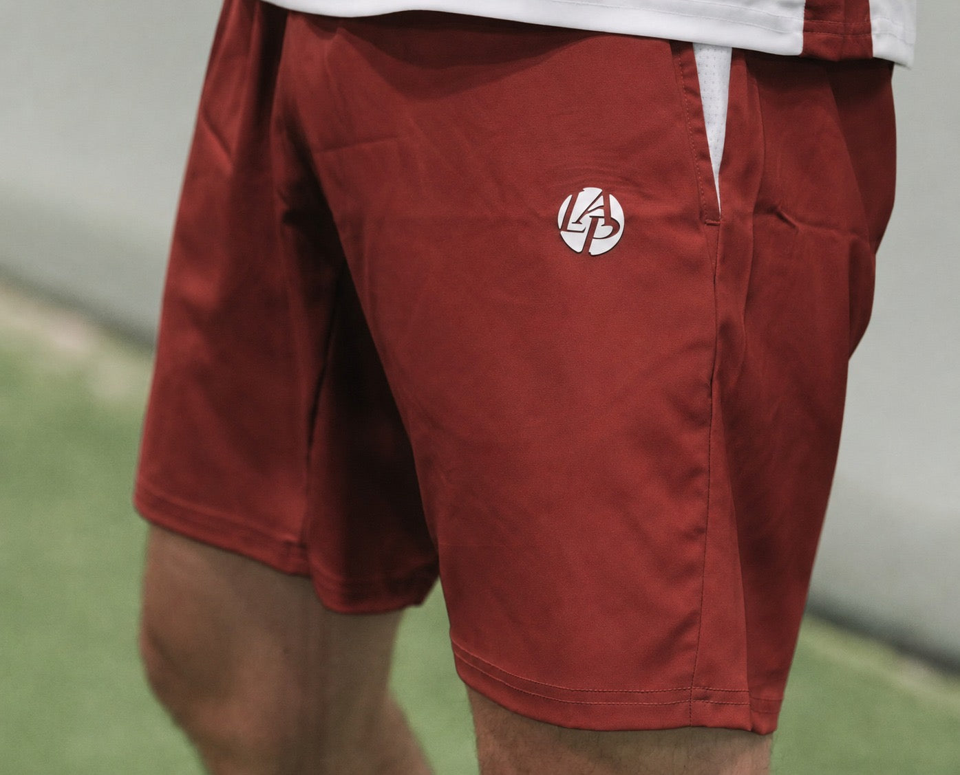 Short technique padel homme KING Terracotta – vue profil – L'Atout Padel